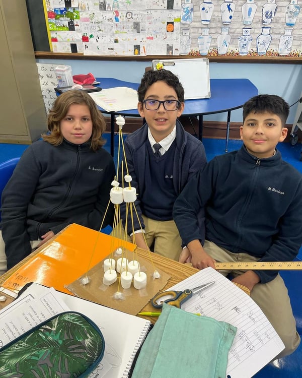 students with marshmallow tower STEM project